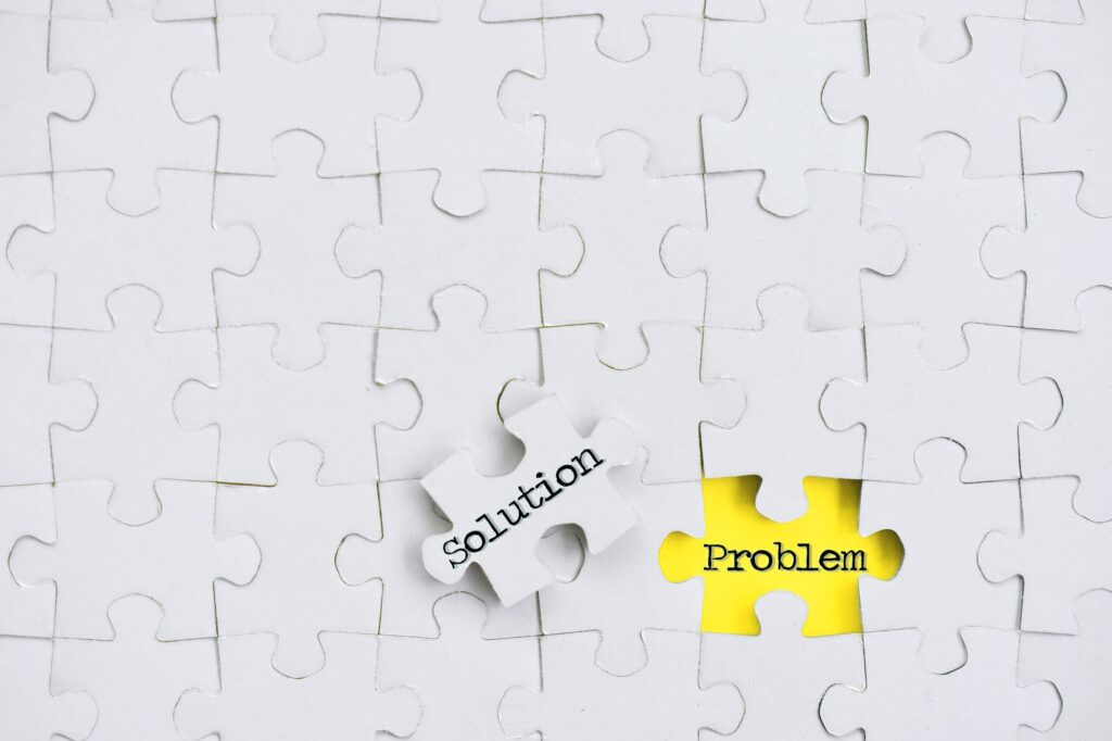Puzzle pieces finding a solution concept - finding the answer to problems, yellow